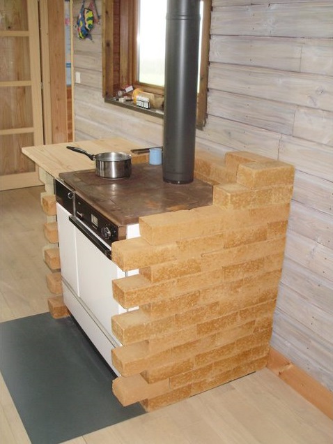 Mur inertie thermique cuisinière à bois